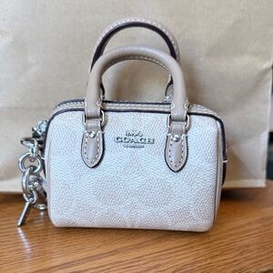 Mini Rowan Bag Charm
In Signature Canvas